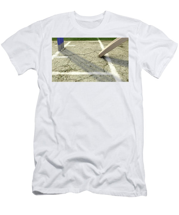 1 Cricket Pitch Ball and Wickets Allan Swart T-Shirt