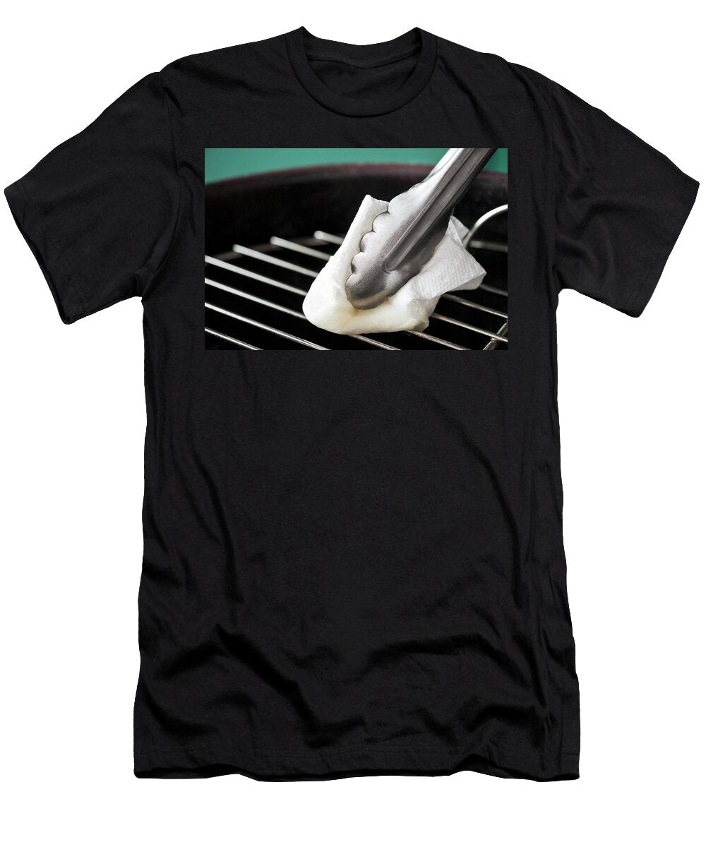 A Barbecue Grill Being Oiled with Kitchen Towel Jim Scherer T-Shirt