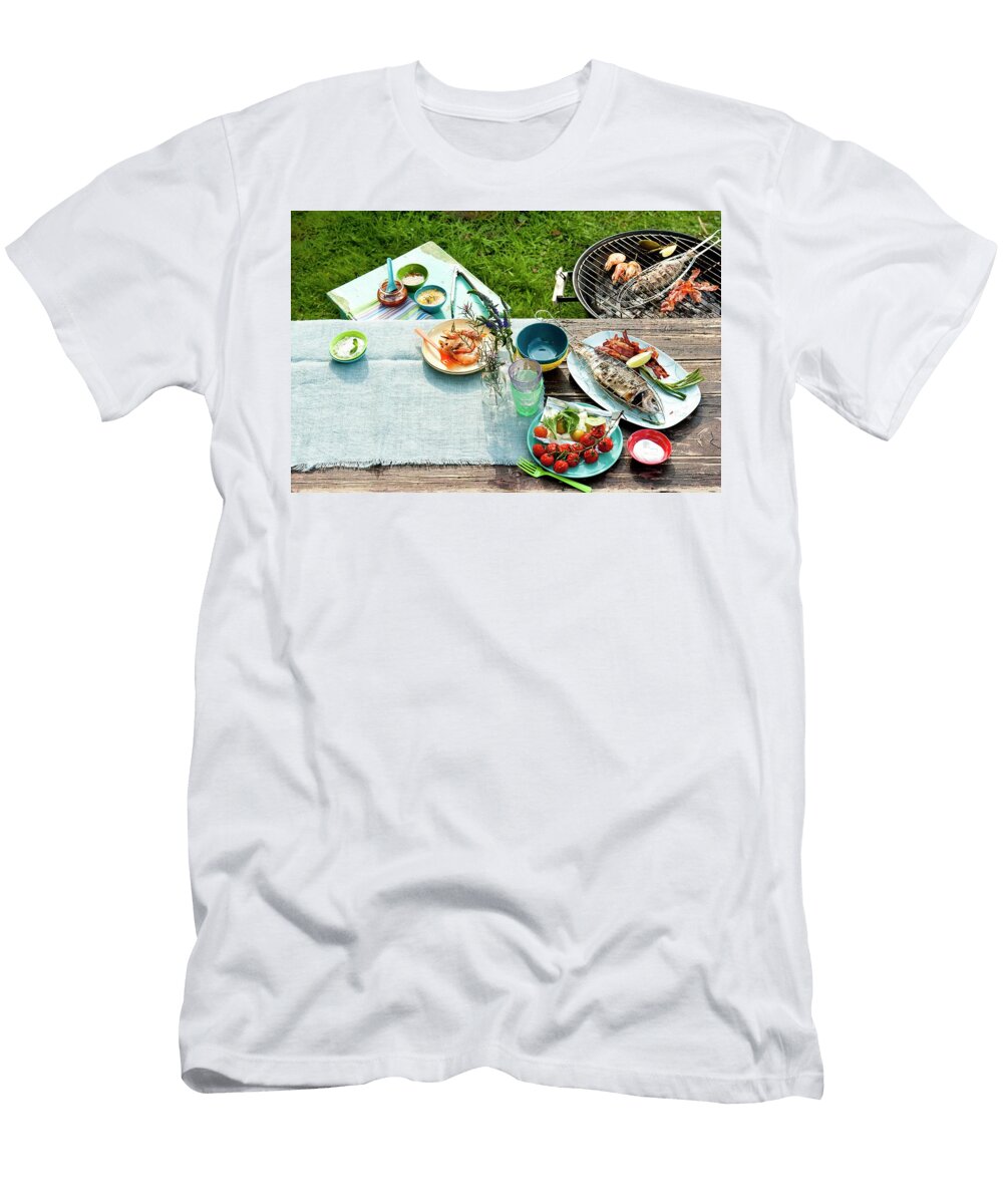 A Barbecue in the Garden with Food on the Barbecue and on the Table Manuela Rther T-Shirt