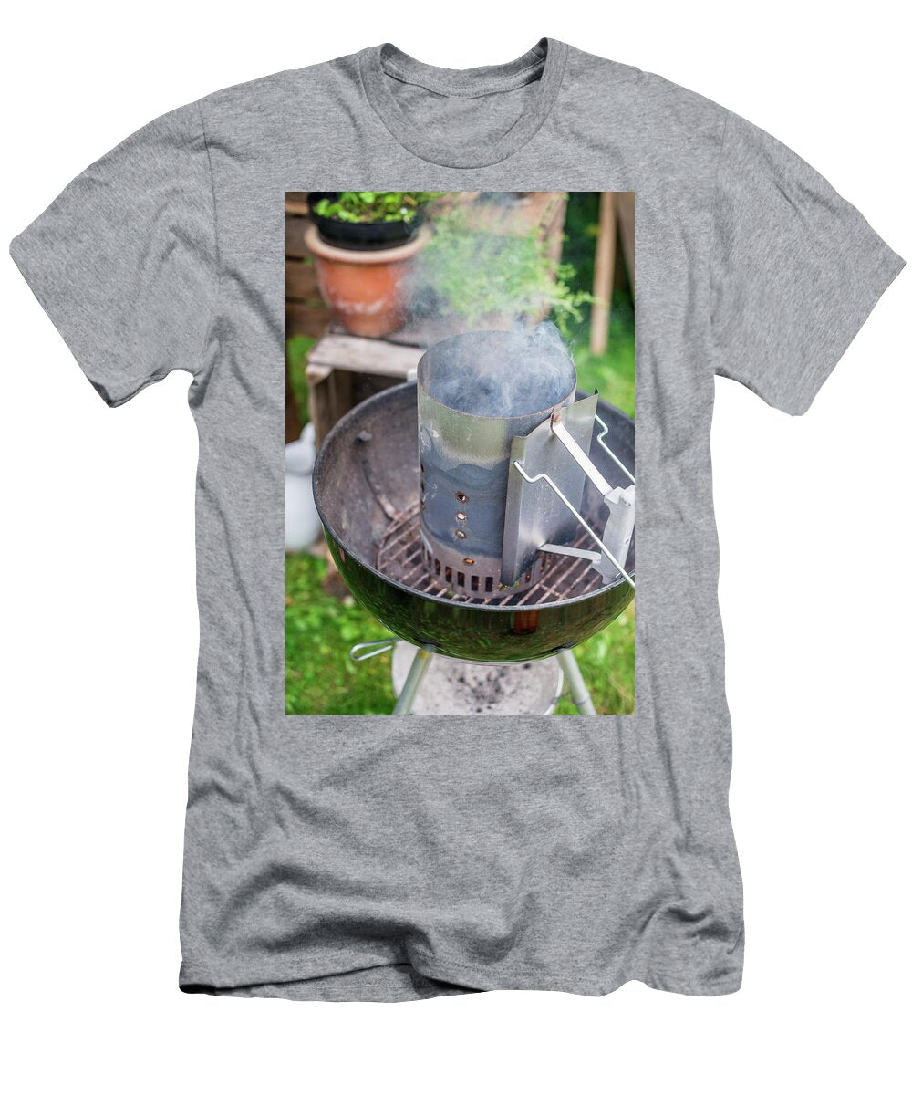 A Fire on a Round Grill in a Garden Sebastian Schollmeyer T-Shirt