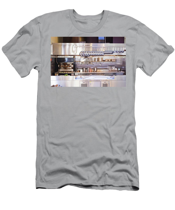 A Professional Kitchen with Hanging Pans of All Sizes Jennifer Martine T-Shirt