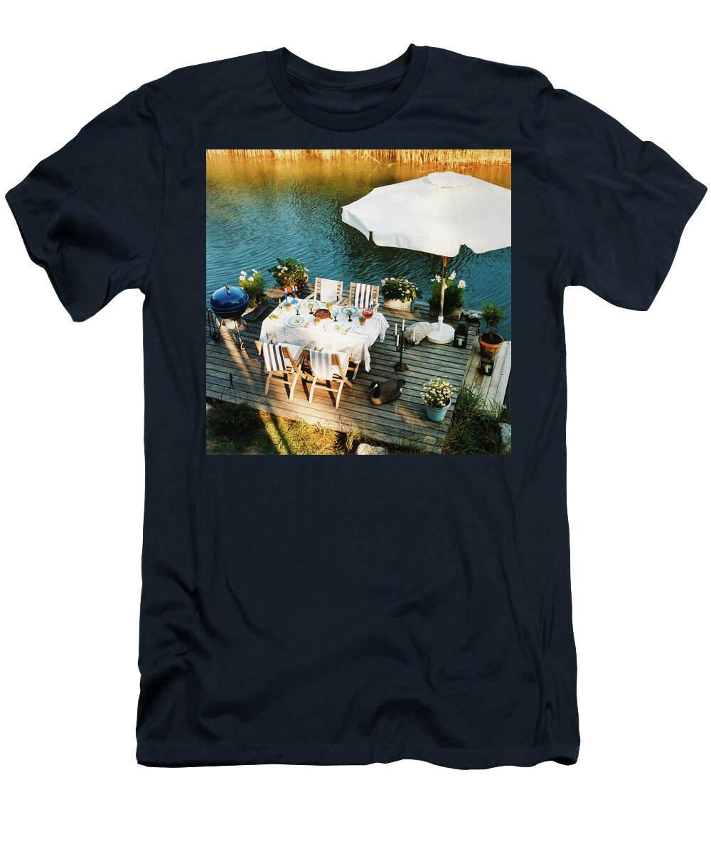A Table Laid on a Wooden Jetty Nilsson Pepe T-Shirt