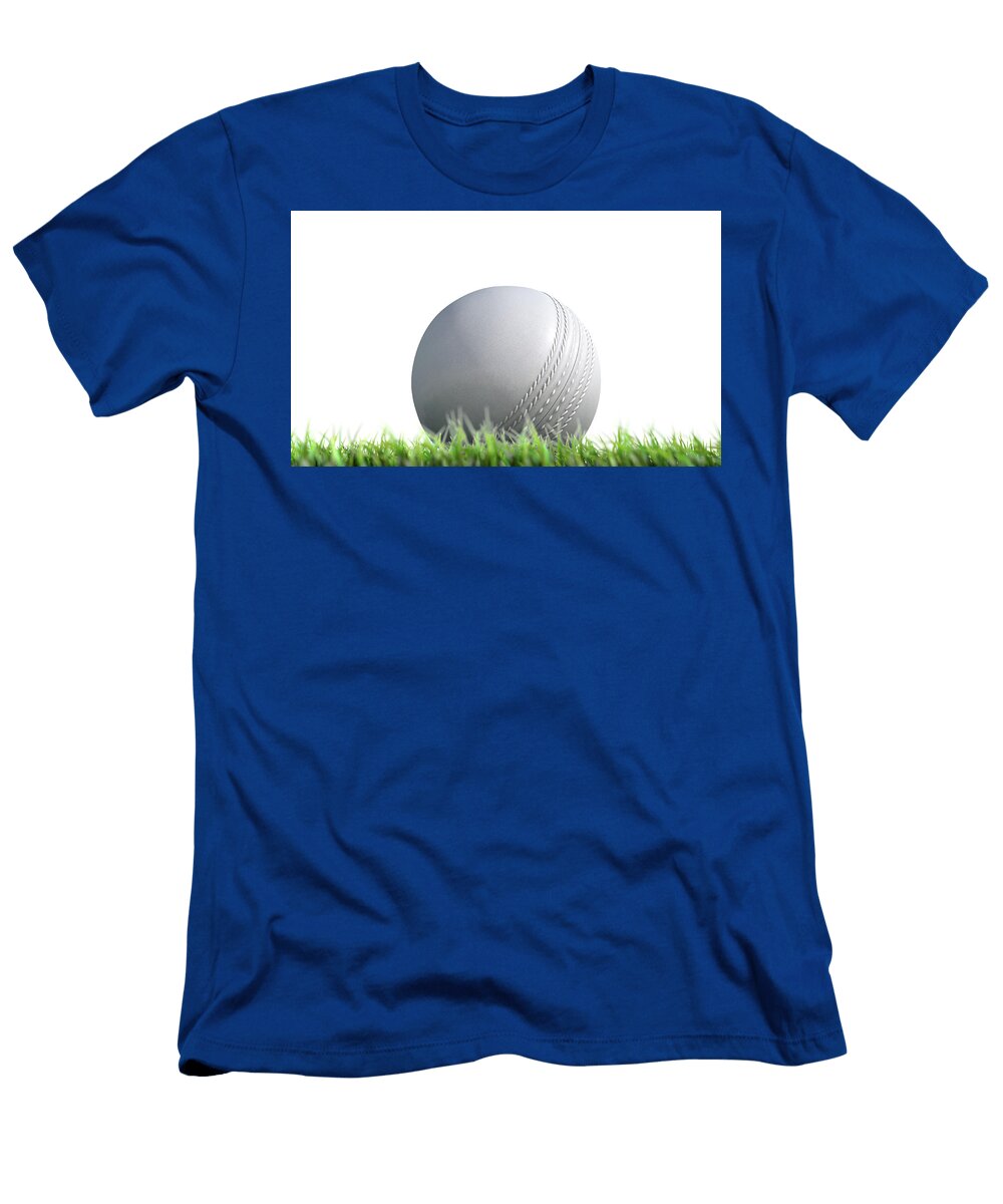 Cricket Ball Resting on Grass Allan Swart T-Shirt