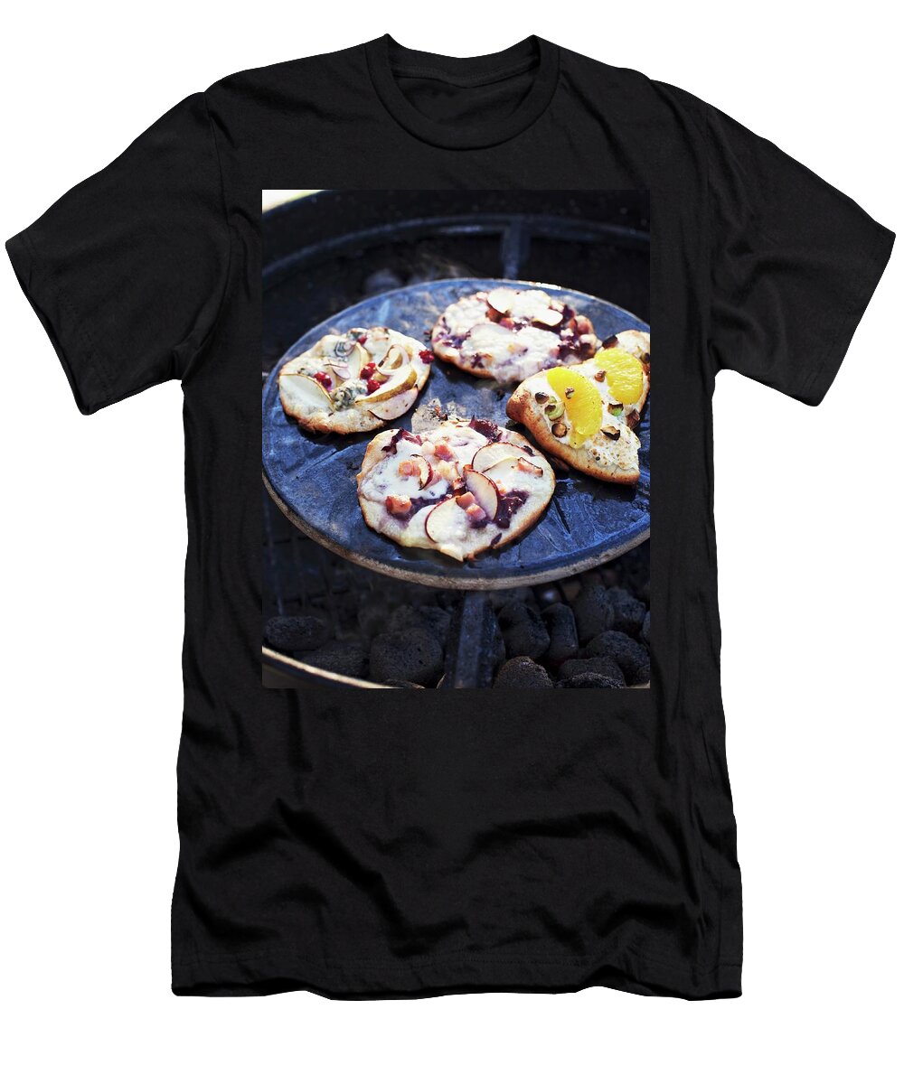 Various Small Pizzas on a Barbecue Hannah Kompanik T-Shirt